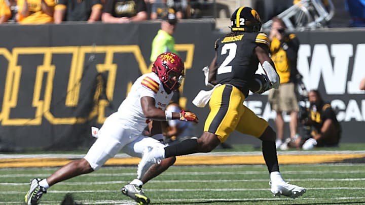 Iowa Hawkeyes's running back Kaleb Johnson 2) runs for a touchdown as Iowa State Cyclones defensive back Myles Purchase (5) missed the tackle during the first quarter in the Cy-Hawk series at Kinnick Stadium on Saturday, Sept. 7, 2024, in Iowa City, Iowa.