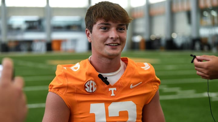 University of Tennessee QB Jake Merklinger (12) speaks to the press on media day at the campus in Knoxville, Tuesday, July 30, 2024.