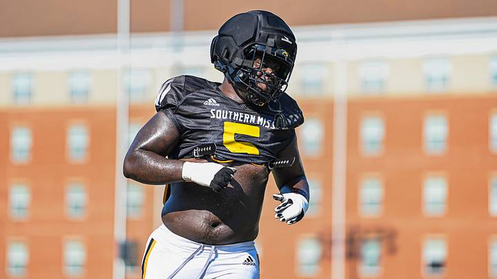 Southern Miss defensive lineman Nasim Cairo (#5) has emerged as one of the vocal leaders of the team during fall camp. Southern Miss defensive lineman Nasim Cairo (#5) has emerged as one of the vocal leaders of the team during fall camp.