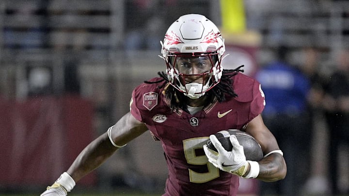 Sep 21, 2024; Tallahassee, Florida, USA; Florida State Seminoles running back Lawrance Toafili (9) runs the ball during the first half against the California Golden Bears at Doak S. Campbell Stadium. Mandatory Credit: Melina Myers-Imagn Images