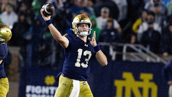 Oct 18, 2025; South Bend, Indiana, USA; Notre Dame Fighting Irish quarterback CJ Carr (13) drops back to pass the ball in the second half against the Southern California Trojans at Notre Dame Stadium. Mandatory Credit: Trevor Ruszkowski-Imagn Images Oct 18, 2025; South Bend, Indiana, USA; Notre Dame Fighting Irish quarterback CJ Carr (13) drops back to pass the ball in the second half against the Southern California Trojans at Notre Dame Stadium. Mandatory Credit: Trevor Ruszkowski-Imagn Images