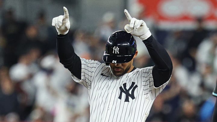 Apr 3, 2025; Bronx, New York, USA; New York Yankees left fielder Jasson Dominguez (24) reacts after hitting a double during the fourth inning against the Arizona Diamondbacks at Yankee Stadium. Mandatory Credit: Vincent Carchietta-Imagn Images