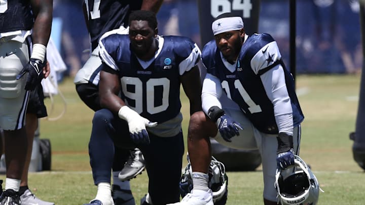 Dallas Cowboys stars DeMarcus Lawrence and Micah Parsons during training camp.