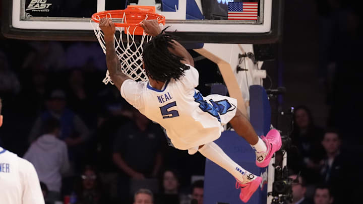 Mar 14, 2025; New York, NY, USA; Creighton Bluejays guard Jamiya Neal (5) dunks on Connecticut Huskies as time ran out on the Huskies in the second half at Madison Square Garden. Mandatory Credit: Robert Deutsch-Imagn Images Mar 14, 2025; New York, NY, USA; Creighton Bluejays guard Jamiya Neal (5) dunks on Connecticut Huskies as time ran out on the Huskies in the second half at Madison Square Garden. Mandatory Credit: Robert Deutsch-Imagn Images