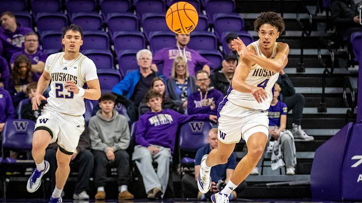 Jasir Rencher, running the fast break, is one of the Huskies' returning players. Jasir Rencher, running the fast break, is one of the Huskies' returning players.