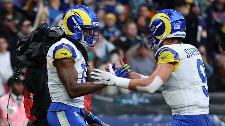 [US, Mexico & Canada customers only] Oct 19, 2025; London, United Kingdom; Los Angeles Rams wide receiver Davante Adams (17) celebrates with quarterback Matthew Stafford (9) after scoring a touchdown against the Jacksonville Jaguars during the first half during a NFL International Series game at Wembley Stadium. Mandatory Credit: Andrew Boyers-Reuters via Imagn Images