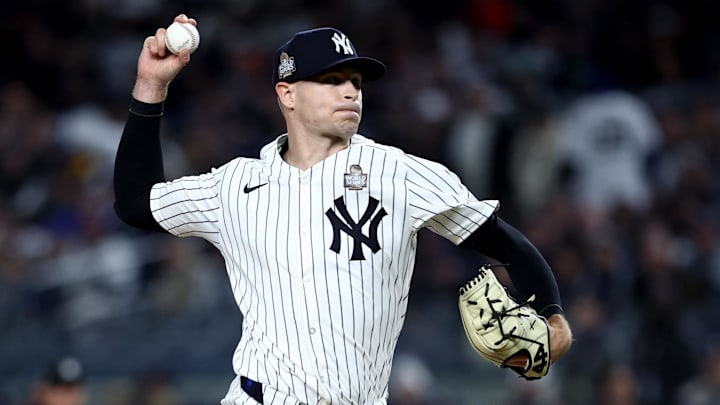 Oct 28, 2024; New York, New York, USA; New York Yankees pitcher Jake Cousins (61) throws during the sixth inning against the Los Angeles Dodgers in game three of the 2024 MLB World Series at Yankee Stadium. Mandatory Credit: Wendell Cruz-Imagn Images