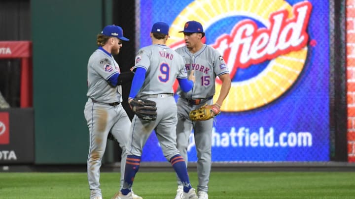 Mets outfielders Bader, Nimmo, Taylor left to right
