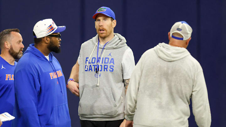 Florida offensive line coach Phil Trautwein, center, is shown during spring practice at Sanders Practice Fields in Gainesville, FL on Thursday, March 12, 2026. [Alan Youngblood/Gainesville Sun]