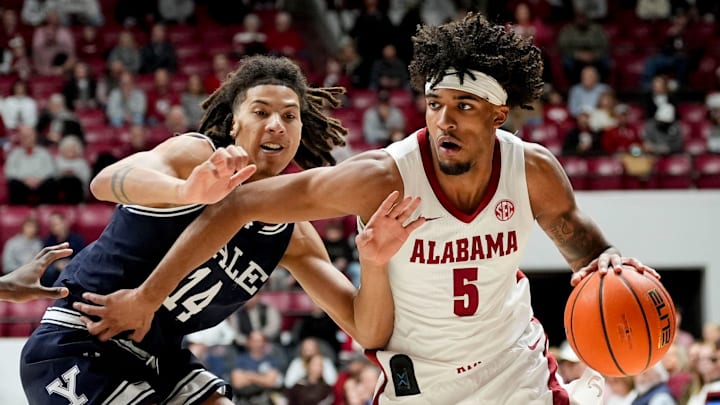 Dec 29, 2025; Tuscaloosa, AL, USA; Alabama forward Amari Allen (5) drives against Yale guard Casey Simmons (14) at Coleman Coliseum. Mandatory Credit: Gary Cosby Jr.-Tuscaloosa News