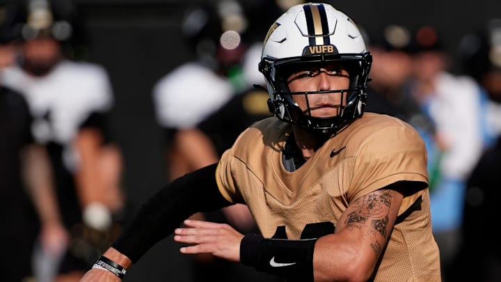 Vanderbilt quarterback Blaze Berlowitz (19) passes during practice at FirstBank Stadium Thursday, Aug. 7, 2025, in Nashville, Tenn. Vanderbilt quarterback Blaze Berlowitz (19) passes during practice at FirstBank Stadium Thursday, Aug. 7, 2025, in Nashville, Tenn.