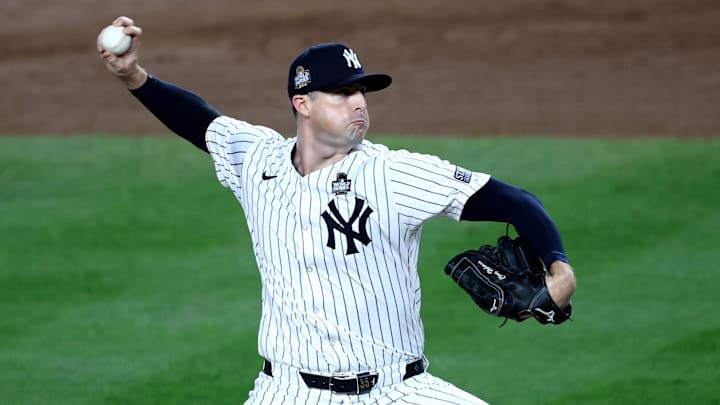 Oct 30, 2024; New York, New York, USA; New York Yankees pitcher Clay Holmes (35) throws during the seventh inning against the Los Angeles Dodgers in game five of the 2024 MLB World Series at Yankee Stadium.