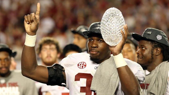 Jan 7, 2013; Miami, FL, USA; Alabama Crimson Tide linebacker C.J. Mosley (32) celebrates with the Coaches Trophy after the 2013 BCS Championship game against the Notre Dame Fighting Irish at Sun Life Stadium. Alabama won 42-14. Mandatory Credit: Matthew Emmons-Imagn Images Jan 7, 2013; Miami, FL, USA; Alabama Crimson Tide linebacker C.J. Mosley (32) celebrates with the Coaches Trophy after the 2013 BCS Championship game against the Notre Dame Fighting Irish at Sun Life Stadium. Alabama won 42-14. Mandatory Credit: Matthew Emmons-Imagn Images