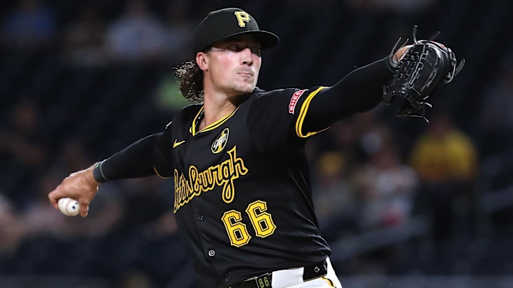 Aug 18, 2025; Pittsburgh, Pennsylvania, USA;  Pittsburgh Pirates relief pitcher Kyle Nicolas (66) pitches against the Toronto Blue Jays during the eighth inning at PNC Park. Mandatory Credit: Charles LeClaire-Imagn Images