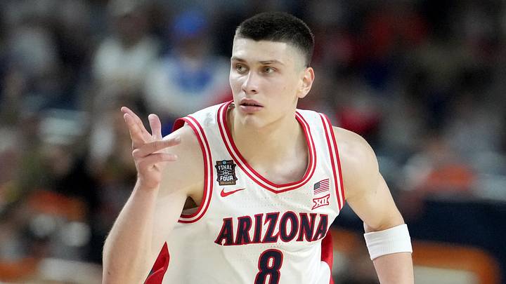Arizona Wildcats forward Ivan Kharchenkov (8) reacts after a made basket Saturday, April 4, 2026, during a Final Four game against the Michigan Wolverines at Lucas Oil Stadium in Indianapolis. Arizona Wildcats forward Ivan Kharchenkov (8) reacts after a made basket Saturday, April 4, 2026, during a Final Four game against the Michigan Wolverines at Lucas Oil Stadium in Indianapolis.