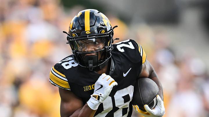 Aug 30, 2025; Iowa City, Iowa, USA; Iowa Hawkeyes running back Kamari Moulton (28) runs the ball against the Albany Great Danes during the first quarter at Kinnick Stadium. Mandatory Credit: Jeffrey Becker-Imagn Images