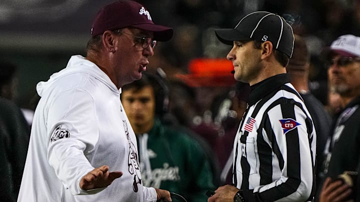 Texas A&M head coach Mike Elko argues with an official about an overturned tageting call against the Texas Longhorns during the Lone Star Showdown at Kyle Field on Saturday, Nov. 30, 2024 in College Station, Texas.