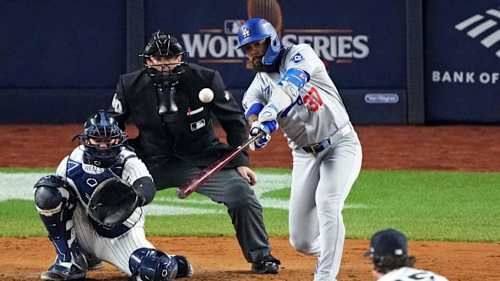 Oct 30, 2024; New York, New York, USA; Los Angeles Dodgers outfielder Teoscar Hernandez (37) hits a two RBI double during the fifth inning against the New York Yankees in game four of the 2024 MLB World Series at Yankee Stadium. Mandatory Credit: Robert Deutsch-Imagn Images