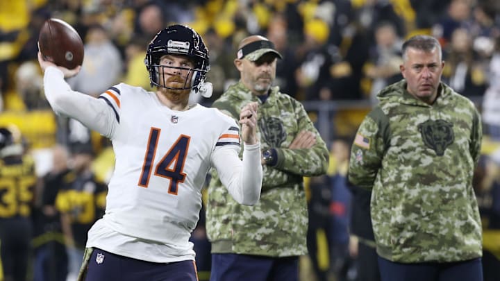 Nov 8, 2021; Pittsburgh, Pennsylvania, USA;  Chicago Bears quarterback Andy Dalton (14) warms up as Bears head coach Matt Nagy (middle) and quarterbacks coach John DeFilippo (right) observe before the game against the Pittsburgh Steelers at Heinz Field. Mandatory Credit: Charles LeClaire-Imagn Images