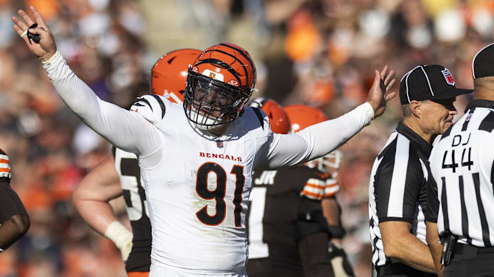 Oct 20, 2024; Cleveland, Ohio, USA; Cincinnati Bengals defensive end Trey Hendrickson (91) reacts following penalty flags being thrown during the fourth quarter against the Cleveland Browns at Huntington Bank Field. The penalties were against the Browns. Mandatory Credit: Scott Galvin-Imagn Images