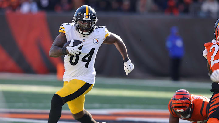 Dec 1, 2024; Cincinnati, Ohio, USA;  Pittsburgh Steelers running back Cordarrelle Patterson (84) runs the ball during the first quarter against the Cincinnati Bengals at Paycor Stadium. Mandatory Credit: Joseph Maiorana-Imagn Images