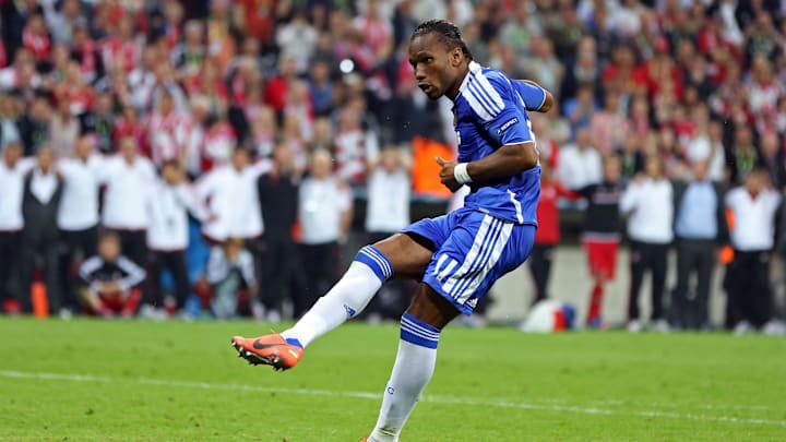May 19, 2012; Munich, GERMANY; Chelsea forward Didier Drogba (11) scores the winning penalty kick during the UEFA Champions League final against Bayern Munich at Allianz Arena.  Mandatory Credit: Mitchell Gunn-Imagn Images