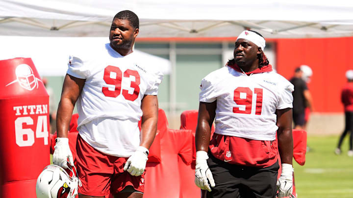 Arizona Cardinals defensive linemen Calais Campbell (93) and L.J. Collier (91) during minicamp at Cardinals training center in Tempe on June 12, 2025.