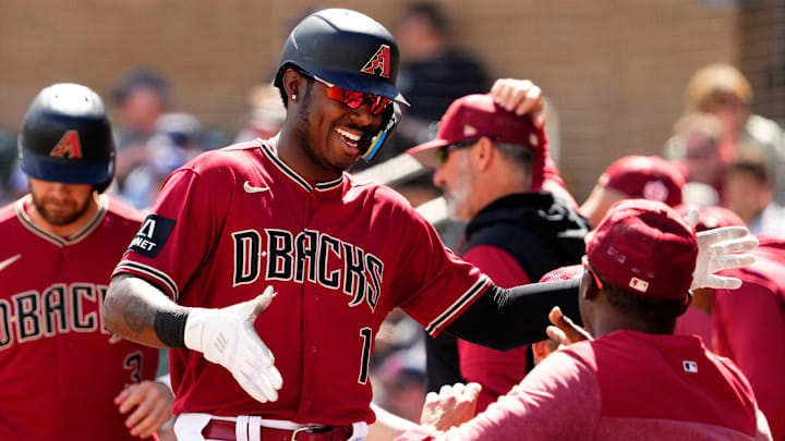 Arizona Diamondbacks right fielder Kyle Lewis (1) reacts after hitting a two-run home run against
