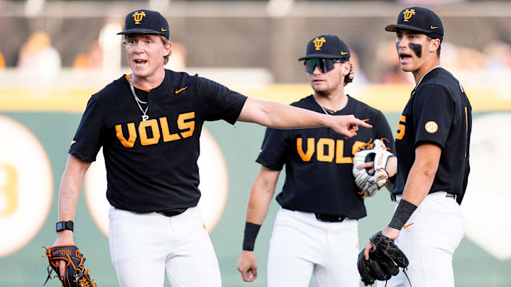 Tennessee's Liam Doyle (12) points to second base as he and the infielders plead for a review for a potential double play during a college baseball game between Tennessee and Vanderbilt at Lindsey Nelson Stadium in Knoxville, Tenn., on May 9, 2025.