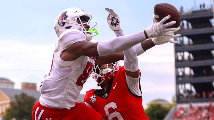 Sep 6, 2025; Athens, Georgia, USA; Georgia Bulldogs defensive back Daylen Everette (6) breaks up a pass intended for Austin Peay Governors wide receiver Jaden Robinson (81) in the third quarter at Sanford Stadium. Mandatory Credit: Brett Davis-Imagn Images
