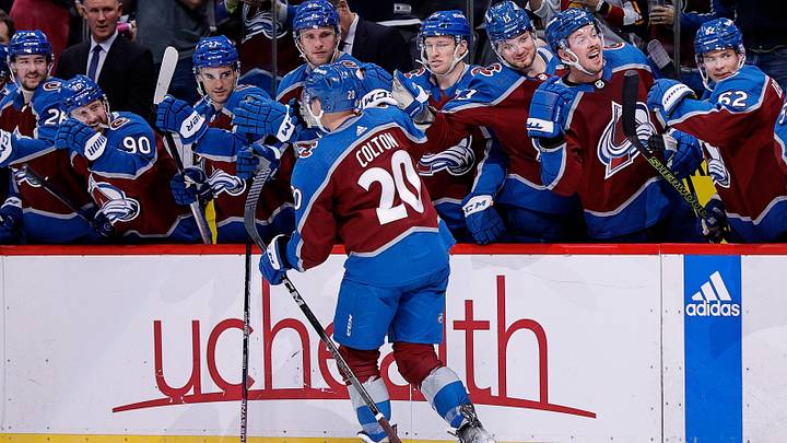 Colorado Avalanche center Ross Colton (20) celebrates with the bench after his goal in the second period against the New Jersey Devils at Ball Arena. Mandatory Credit: Isaiah J. Downing-Imagn Images