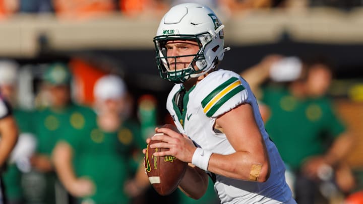 Sep 27, 2025; Stillwater, Oklahoma, USA;  Baylor Bears quarterback Cade Tessier (17) looks to pass during the second half against the Oklahoma State Cowboys at Boone Pickens Stadium. Mandatory Credit: William Purnell-Imagn Images