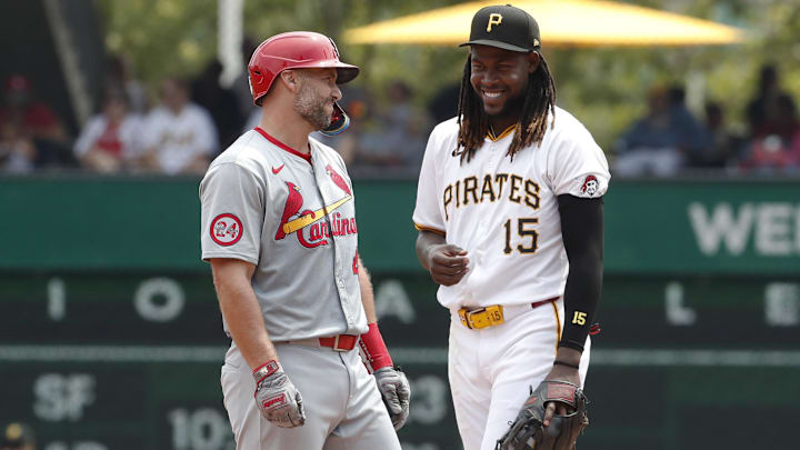 St. Louis Cardinals first baseman Paul Goldschmidt (left) and Pittsburgh Pirates shortstop Oneil Cruz (15) share a laugh at second base after a double by Goldschmidt during the sixth inning at PNC Park. 