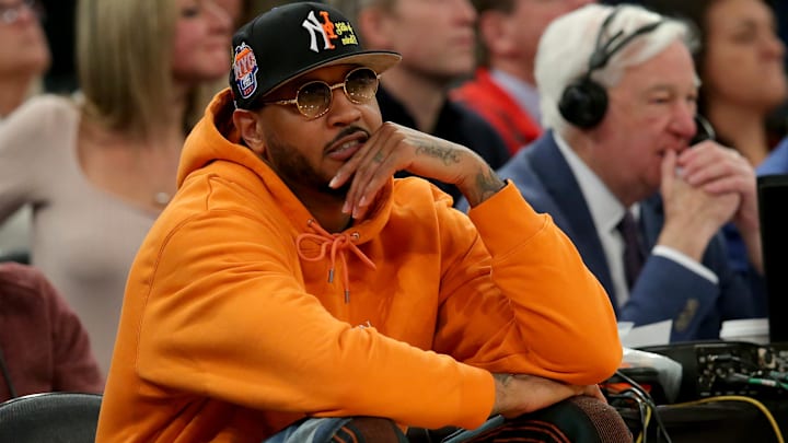 Mar 8, 2023; New York, NY, USA; New York Knicks former player Carmelo Anthony sits courtside during the second half between the Villanova Wildcats and the Georgetown Hoyas at Madison Square Garden. Mandatory Credit: Brad Penner-Imagn Images