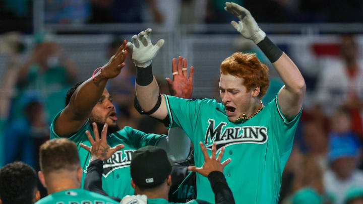 Owen Caissie celebrates with teammates after hitting a two-run walk-off home run against the Colorado Rockies. Owen Caissie celebrates with teammates after hitting a two-run walk-off home run against the Colorado Rockies.