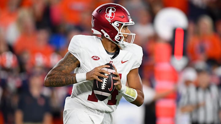 Sep 20, 2024; Syracuse, New York, USA; Stanford Cardinal quarterback Ashton Daniels (14) looks to pass against the Syracuse Orange during the second half at the JMA Wireless Dome. Mandatory Credit: Rich Barnes-Imagn Images