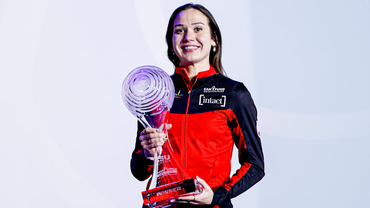 Courtney Sarault of Canada with a trophy competing on the ISU Crystal Globe Award Ceremony on Day 4 of the ISU Short Track World Tour