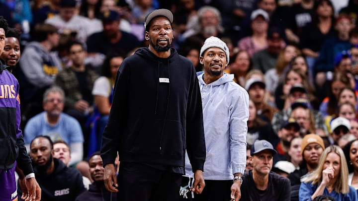 Oct 13, 2024; Denver, Colorado, USA; Phoenix Suns forward Kevin Durant (35) and guard Bradley Beal (3) look on in the third quarter against the Denver Nuggets at Ball Arena. Mandatory Credit: Isaiah J. Downing-Imagn Images