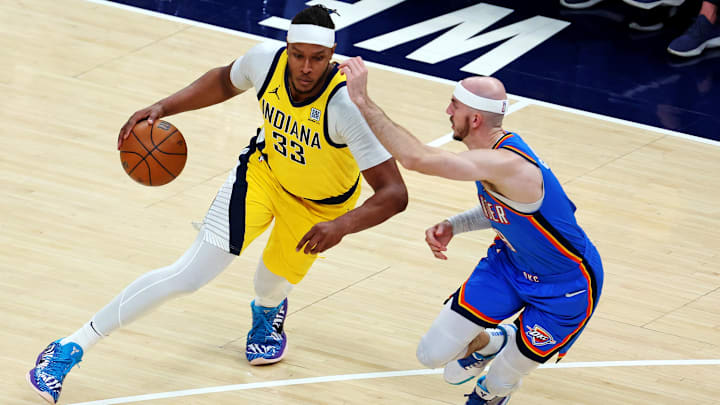 Jun 11, 2025; Indianapolis, Indiana, USA; Indiana Pacers center Myles Turner (33) shoots the ball against Oklahoma City Thunder guard Alex Caruso (9) during the first quarter in game three of the 2025 NBA Finals at Gainbridge Fieldhouse. Mandatory Credit: Trevor Ruszkowski-Imagn Images