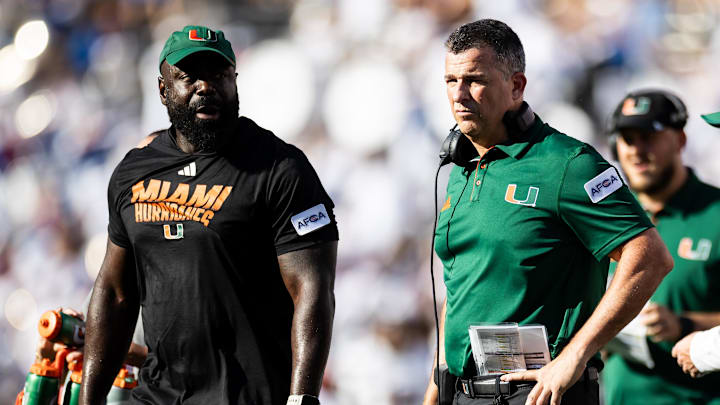 Aug 31, 2024; Gainesville, Florida, USA; Miami Hurricanes head coach Mario Cristobal looks during the second half against the Florida Gators at Ben Hill Griffin Stadium. Mandatory Credit: Matt Pendleton-Imagn Images Aug 31, 2024; Gainesville, Florida, USA; Miami Hurricanes head coach Mario Cristobal looks during the second half against the Florida Gators at Ben Hill Griffin Stadium. Mandatory Credit: Matt Pendleton-Imagn Images