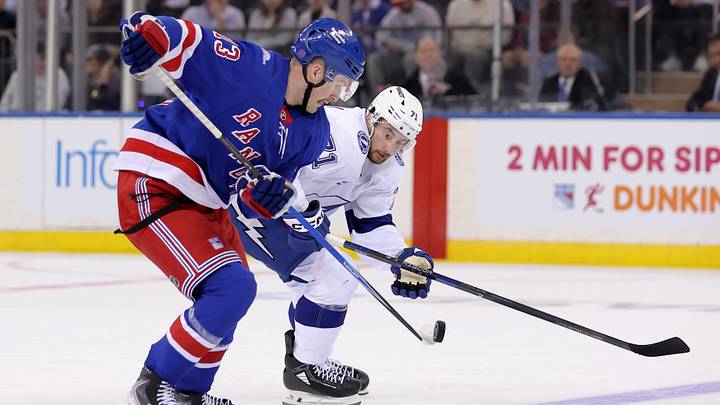 Oct 13, 2026; New York, New York, USA; New York Rangers left wing Alexis Lafreniere (13) plays the puck against Tampa Bay Lightning center Anthony Cirelli (71) during the first period at Madison Square Garden. Mandatory Credit: Brad Penner-Imagn Images Oct 13, 2026; New York, New York, USA; New York Rangers left wing Alexis Lafreniere (13) plays the puck against Tampa Bay Lightning center Anthony Cirelli (71) during the first period at Madison Square Garden. Mandatory Credit: Brad Penner-Imagn Images