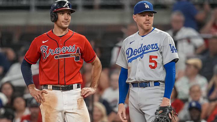 Atlanta Braves first baseman Matt Olson on base next to Los Angeles Dodgers first baseman Freddie Freeman. Atlanta Braves first baseman Matt Olson on base next to Los Angeles Dodgers first baseman Freddie Freeman.