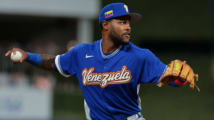 Mar 17, 2026; Miami, FL, United States; Venezuela third baseman Maikel Garcia (23) makes a throw to first base for an out against the United States in the seventh inning during the 2026 World Baseball Classic Championship game at loanDepot Park. Mandatory Credit: Sam Navarro-Imagn Images