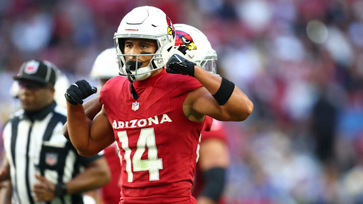 Dec 7, 2025; Glendale, Arizona, USA; Arizona Cardinals wide receiver Michael Wilson (14) reacts during the first half at State Farm Stadium. Mandatory Credit: Mark J. Rebilas-Imagn Images Dec 7, 2025; Glendale, Arizona, USA; Arizona Cardinals wide receiver Michael Wilson (14) reacts during the first half at State Farm Stadium. Mandatory Credit: Mark J. Rebilas-Imagn Images