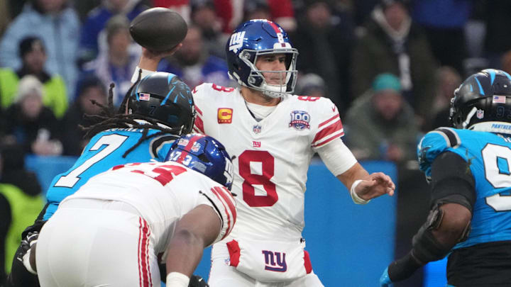 Nov 10, 2024; Munich, Germany; New York Giants quarterback Daniel Jones (8) throws the ball against the Carolina Panthers in the first half during the 2024 NFL Munich Game at Allianz Arena.  