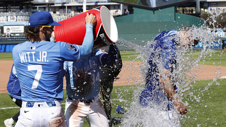 Apr 6, 2025; Kansas City, Missouri, USA; Kansas City Royals shortstop Bobby Witt Jr. (7) dumps the Gartorade bucket on Kansas City Royals pitcher Kris Bubic (50) after winning the game over the Baltimore Orioles at Kauffman Stadium. Mandatory Credit: Gary Rohman-Imagn Images Apr 6, 2025; Kansas City, Missouri, USA; Kansas City Royals shortstop Bobby Witt Jr. (7) dumps the Gartorade bucket on Kansas City Royals pitcher Kris Bubic (50) after winning the game over the Baltimore Orioles at Kauffman Stadium. Mandatory Credit: Gary Rohman-Imagn Images