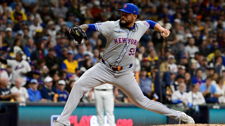 Oct 2, 2024; Milwaukee, Wisconsin, USA; New York Mets pitcher Sean Manaea (59) throws during the second inning in game two of the Wildcard round for the 2024 MLB Playoffs against the Milwaukee Brewers at American Family Field. Mandatory Credit: Benny Sieu-Imagn Images