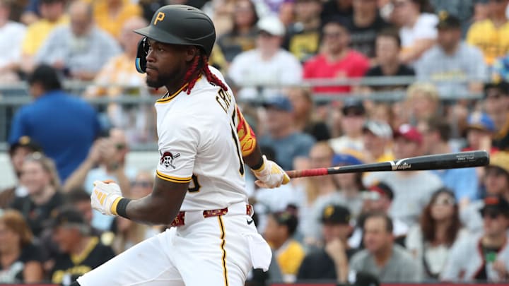 Jul 19, 2025; Pittsburgh, Pennsylvania, USA;  Pittsburgh Pirates center fielder Oneil Cruz (15) hits a triple against the Chicago White Sox during the second inning at PNC Park. Mandatory Credit: Charles LeClaire-Imagn Images
