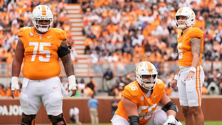 Tennessee offensive linemen Wendell Moe Jr. (75), and Sam Pendleton (56), and quarterback Joey Aguilar (6) wait to line up during the NCAA college football game against ETSU on September 6, 2025, in Knoxville, Tennessee.