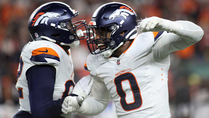 December 28, 2024: Denver Broncos LB Jonathon Cooper (0) celebrates with a teammate during WEEK 17 of the NFL, American Football Herren, USA regular season between the Cincinnati Bengals and the Denver Broncos in Cincinnati, Ohio.